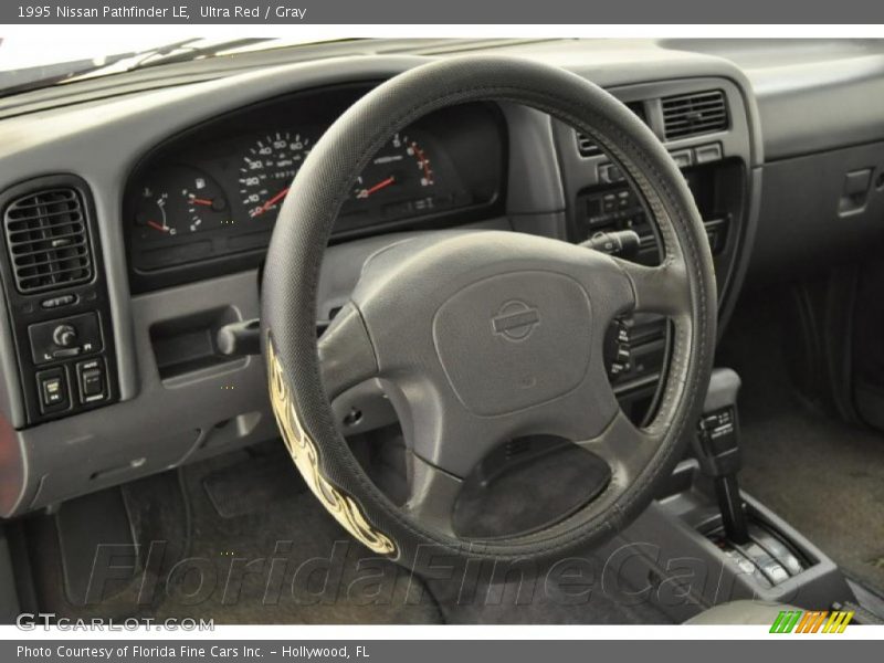 Ultra Red / Gray 1995 Nissan Pathfinder LE