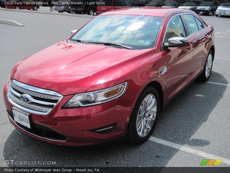 Red Candy Metallic / Light Stone 2010 Ford Taurus Limited