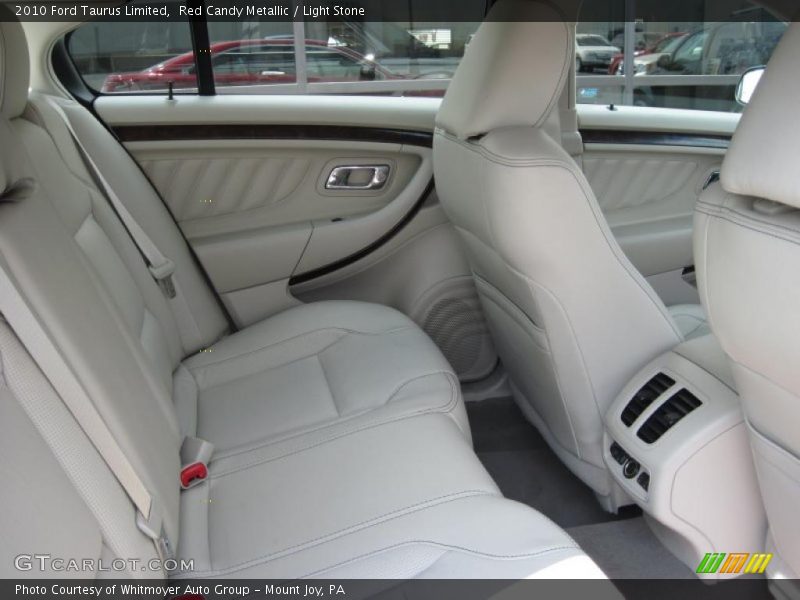Red Candy Metallic / Light Stone 2010 Ford Taurus Limited