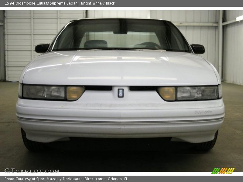 Bright White / Black 1994 Oldsmobile Cutlass Supreme Sedan