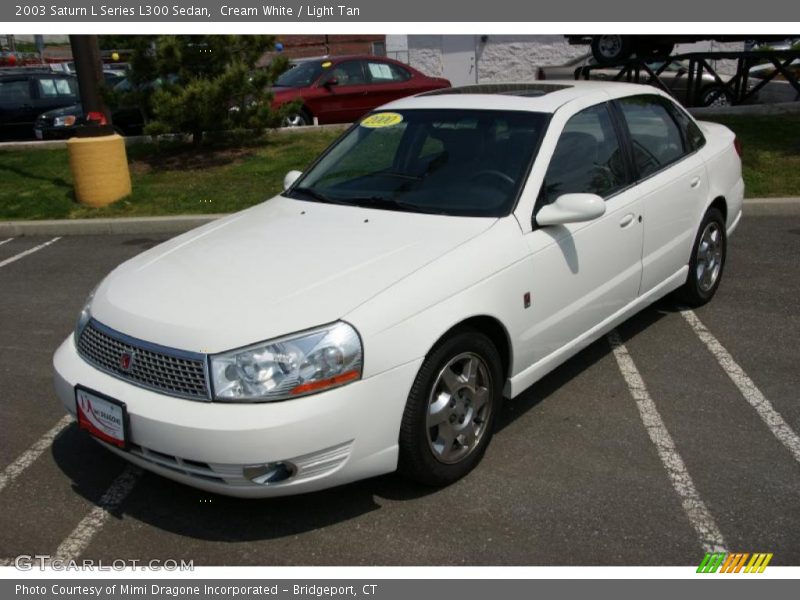 Cream White / Light Tan 2003 Saturn L Series L300 Sedan
