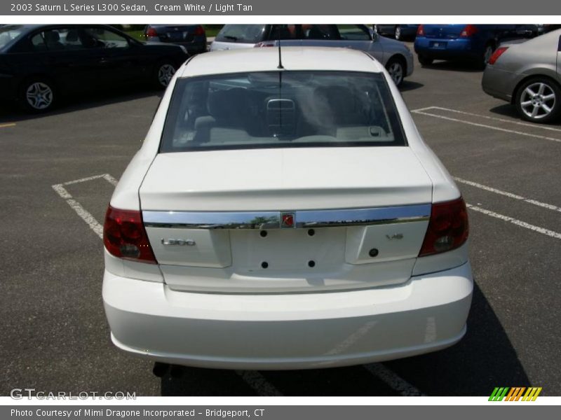 Cream White / Light Tan 2003 Saturn L Series L300 Sedan