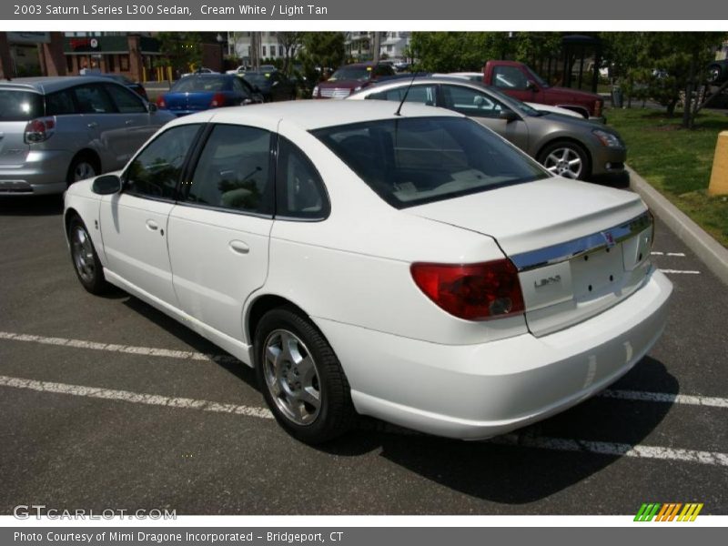 Cream White / Light Tan 2003 Saturn L Series L300 Sedan