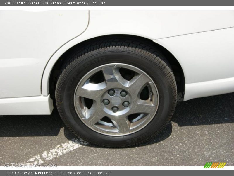 Cream White / Light Tan 2003 Saturn L Series L300 Sedan