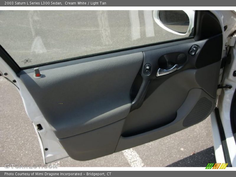 Cream White / Light Tan 2003 Saturn L Series L300 Sedan