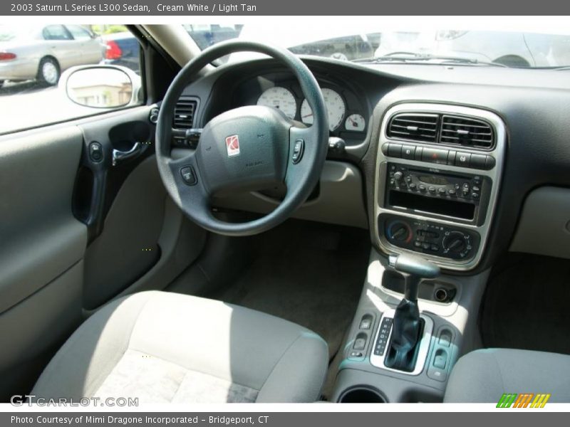 Cream White / Light Tan 2003 Saturn L Series L300 Sedan
