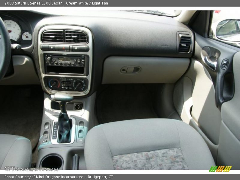 Cream White / Light Tan 2003 Saturn L Series L300 Sedan