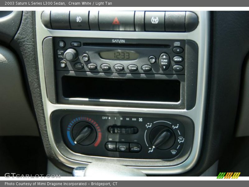 Cream White / Light Tan 2003 Saturn L Series L300 Sedan