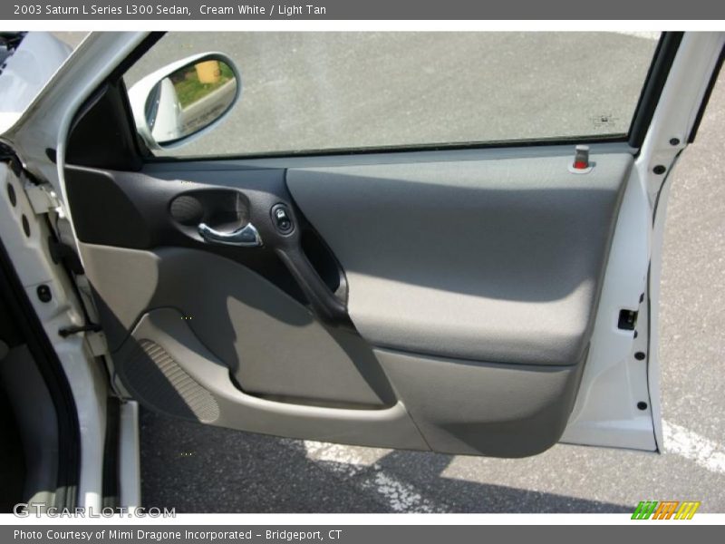 Cream White / Light Tan 2003 Saturn L Series L300 Sedan