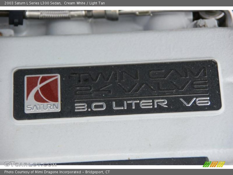 Cream White / Light Tan 2003 Saturn L Series L300 Sedan