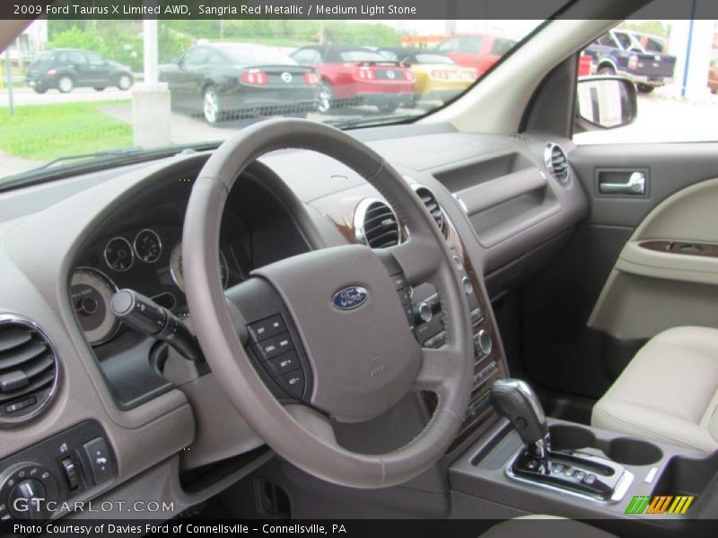 Sangria Red Metallic / Medium Light Stone 2009 Ford Taurus X Limited AWD