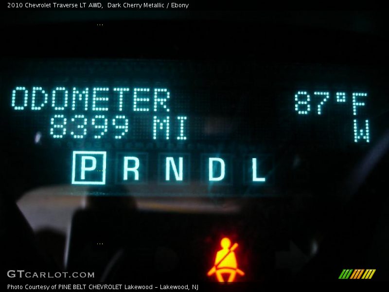 Dark Cherry Metallic / Ebony 2010 Chevrolet Traverse LT AWD