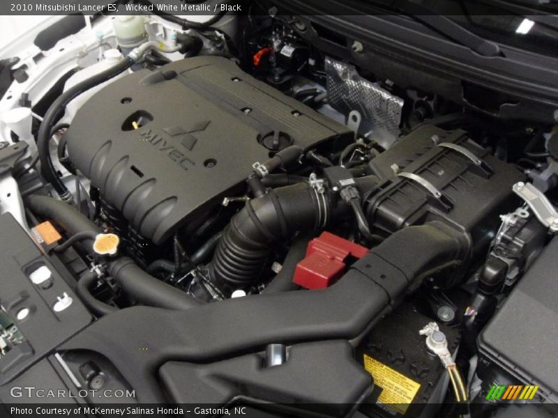 Wicked White Metallic / Black 2010 Mitsubishi Lancer ES