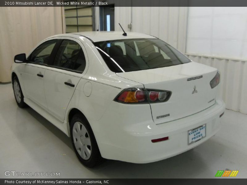 Wicked White Metallic / Black 2010 Mitsubishi Lancer DE
