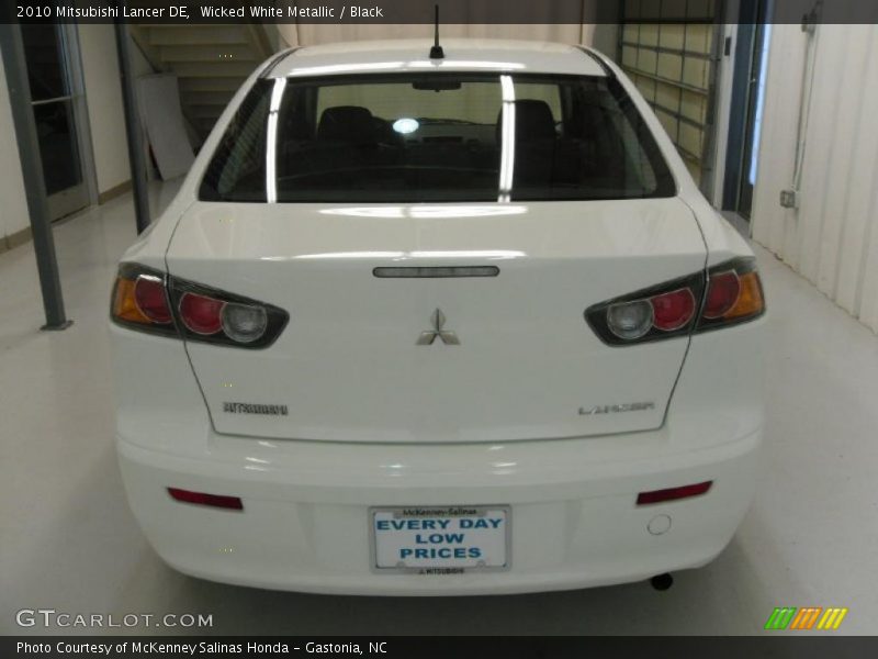Wicked White Metallic / Black 2010 Mitsubishi Lancer DE