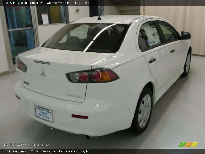Wicked White Metallic / Black 2010 Mitsubishi Lancer DE