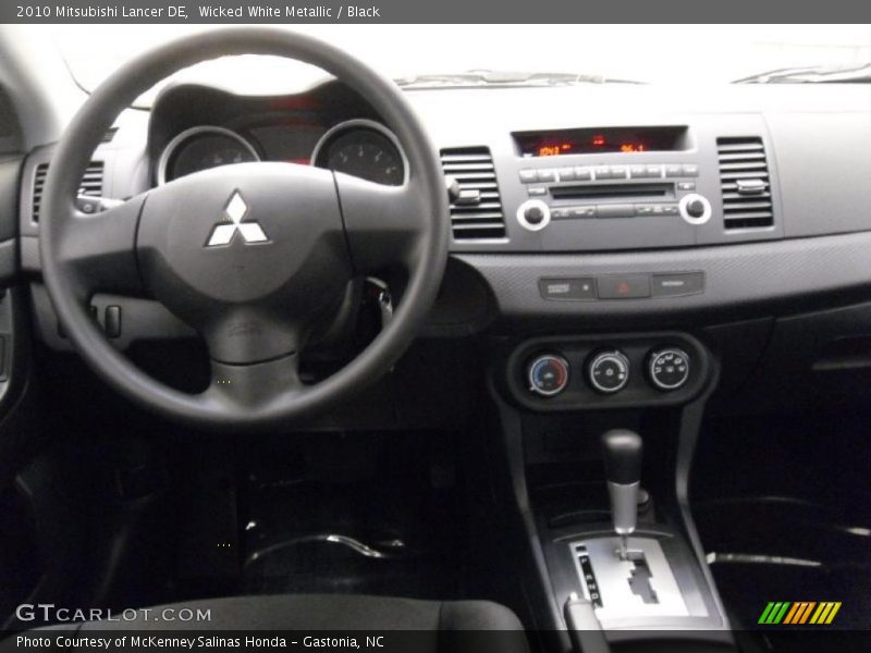 Wicked White Metallic / Black 2010 Mitsubishi Lancer DE