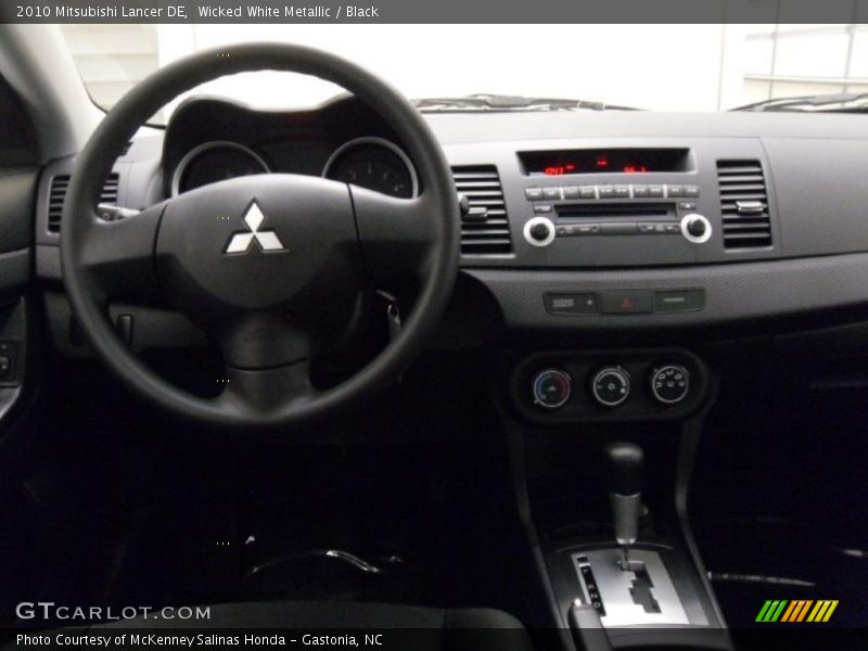 Wicked White Metallic / Black 2010 Mitsubishi Lancer DE