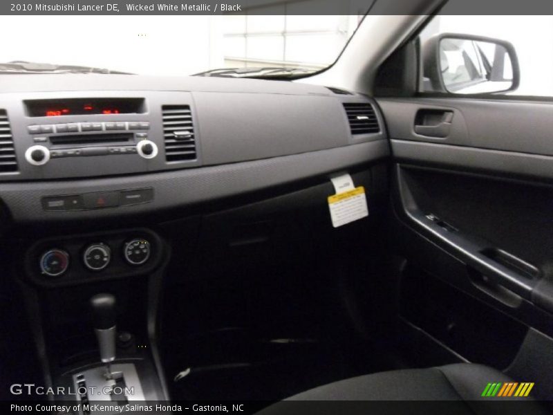 Wicked White Metallic / Black 2010 Mitsubishi Lancer DE