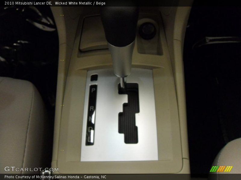 Wicked White Metallic / Beige 2010 Mitsubishi Lancer DE