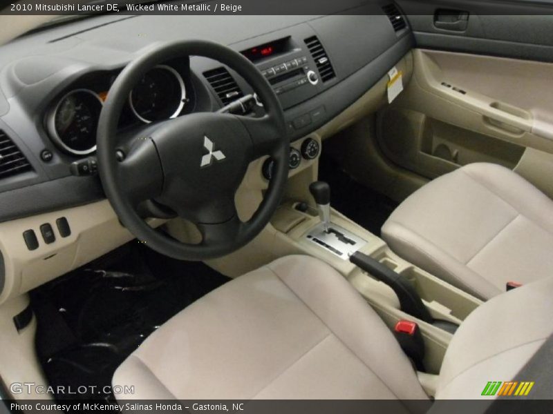 Wicked White Metallic / Beige 2010 Mitsubishi Lancer DE