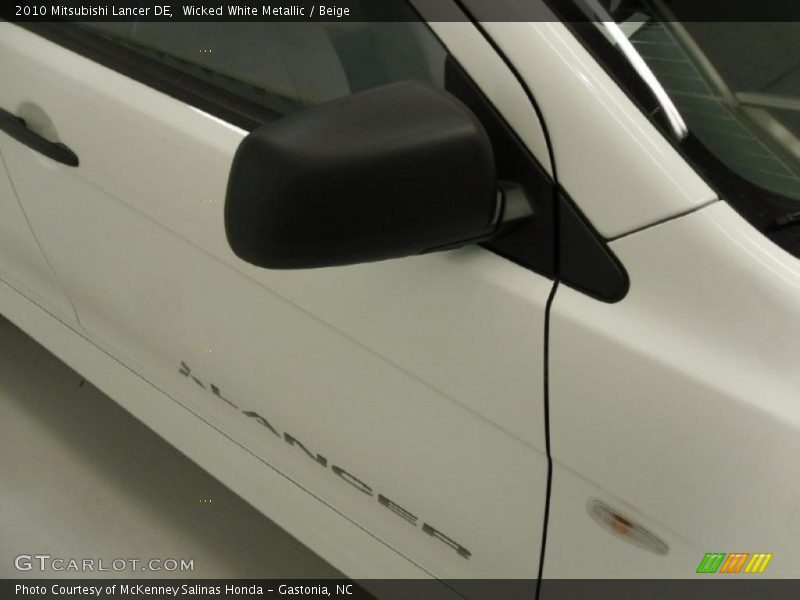 Wicked White Metallic / Beige 2010 Mitsubishi Lancer DE