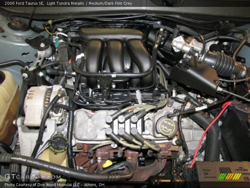 Light Tundra Metallic / Medium/Dark Flint Grey 2006 Ford Taurus SE