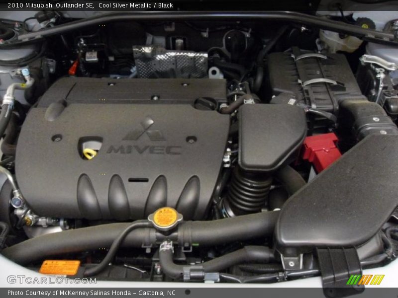 Cool Silver Metallic / Black 2010 Mitsubishi Outlander SE