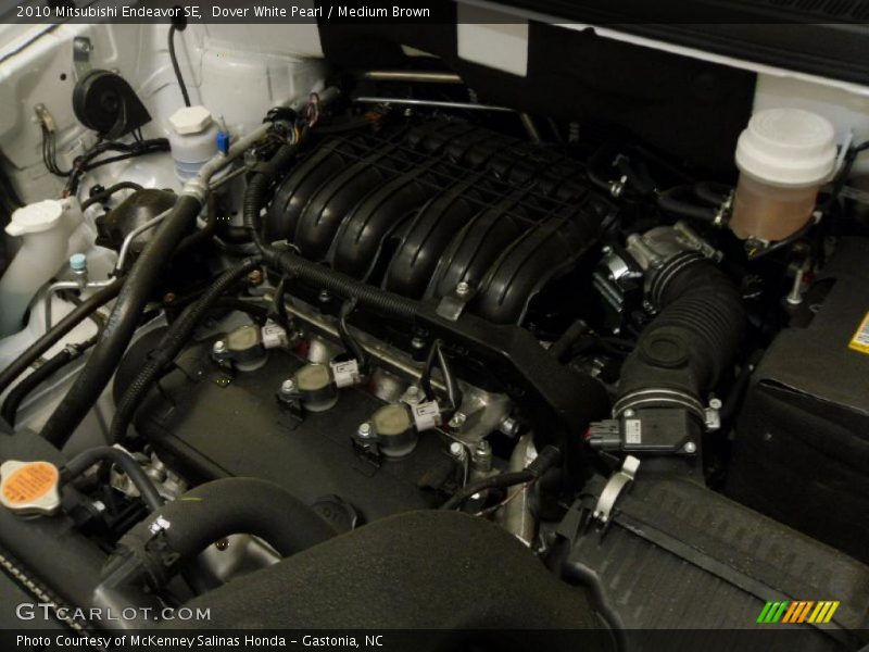 Dover White Pearl / Medium Brown 2010 Mitsubishi Endeavor SE