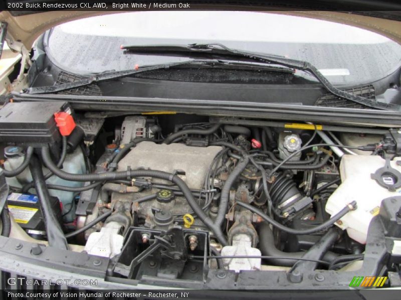 Bright White / Medium Oak 2002 Buick Rendezvous CXL AWD