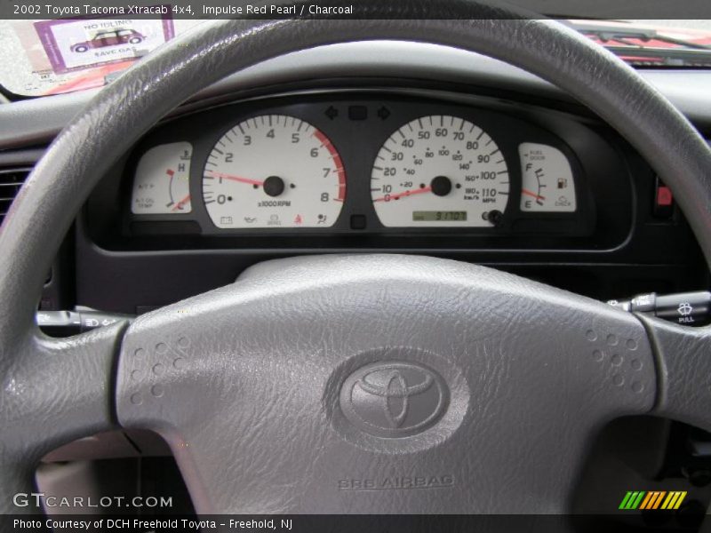 Impulse Red Pearl / Charcoal 2002 Toyota Tacoma Xtracab 4x4