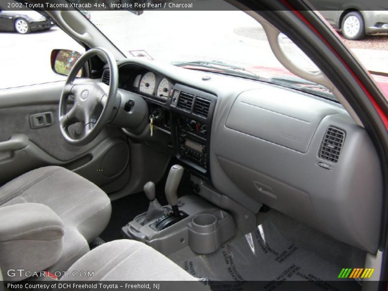 Impulse Red Pearl / Charcoal 2002 Toyota Tacoma Xtracab 4x4