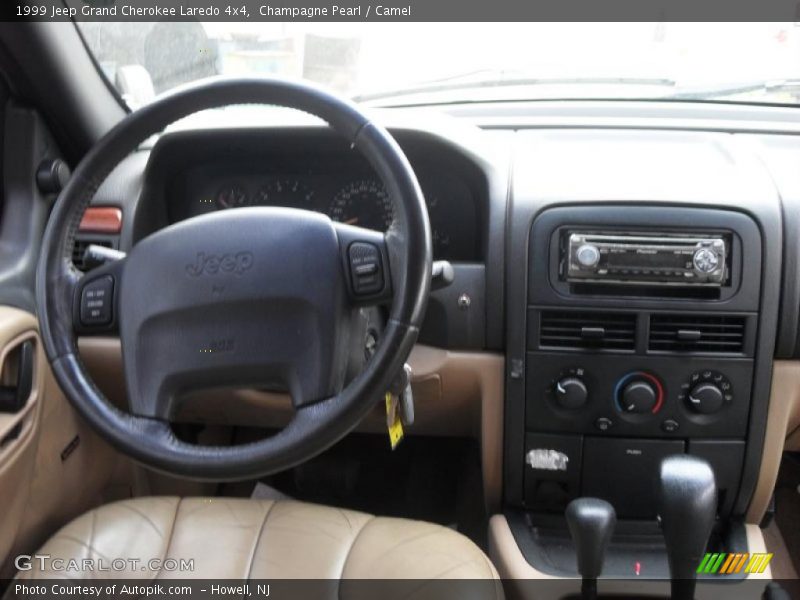 Champagne Pearl / Camel 1999 Jeep Grand Cherokee Laredo 4x4