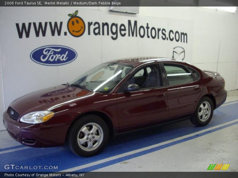 Merlot Metallic / Medium/Dark Pebble Beige 2006 Ford Taurus SE
