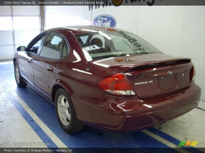 Merlot Metallic / Medium/Dark Pebble Beige 2006 Ford Taurus SE
