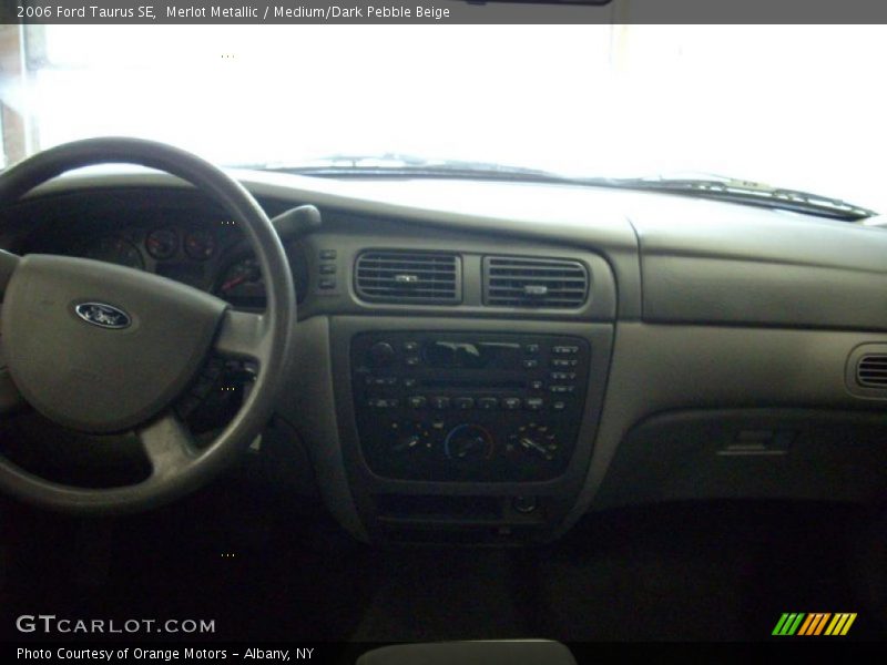 Merlot Metallic / Medium/Dark Pebble Beige 2006 Ford Taurus SE