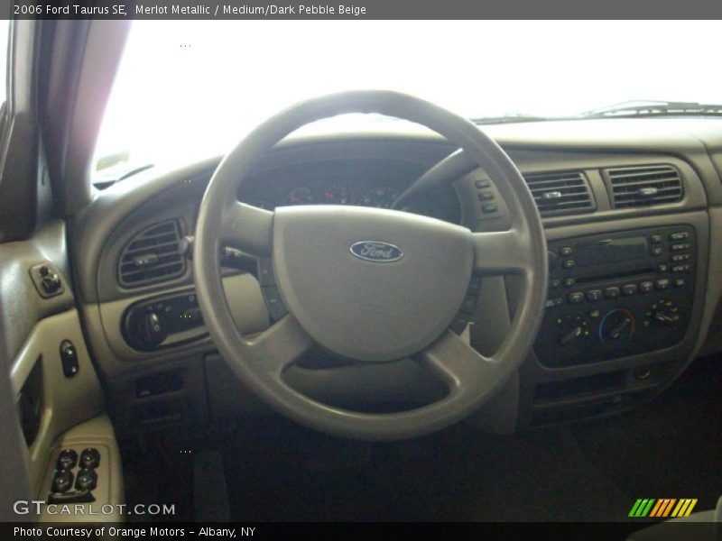 Merlot Metallic / Medium/Dark Pebble Beige 2006 Ford Taurus SE