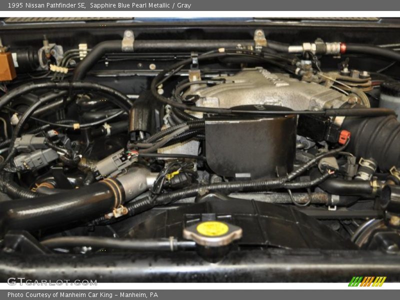 Sapphire Blue Pearl Metallic / Gray 1995 Nissan Pathfinder SE