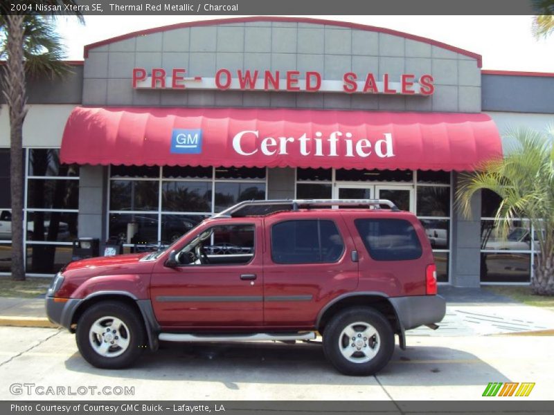 Thermal Red Metallic / Charcoal 2004 Nissan Xterra SE