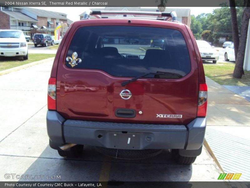Thermal Red Metallic / Charcoal 2004 Nissan Xterra SE