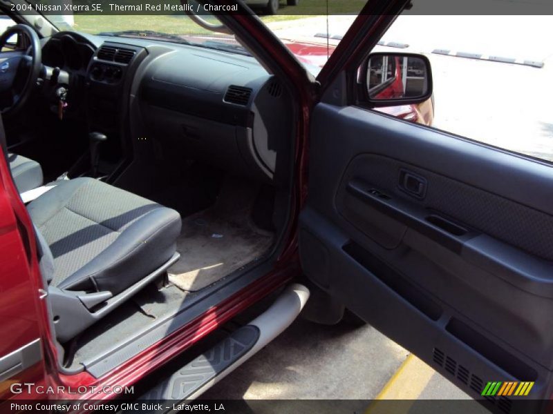 Thermal Red Metallic / Charcoal 2004 Nissan Xterra SE