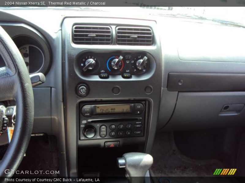Thermal Red Metallic / Charcoal 2004 Nissan Xterra SE