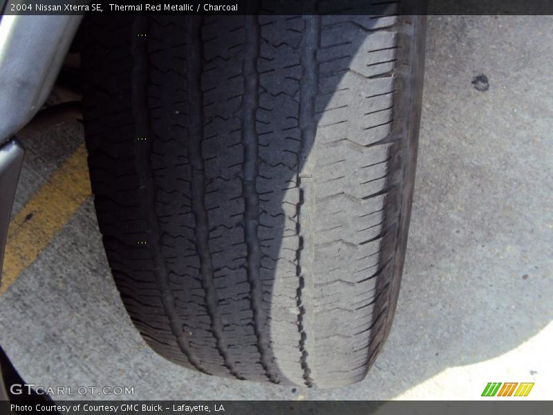 Thermal Red Metallic / Charcoal 2004 Nissan Xterra SE