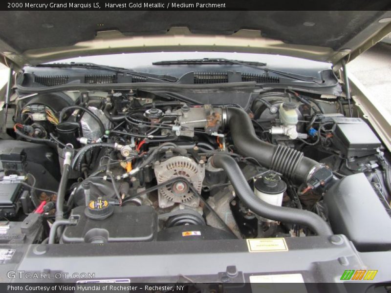 Harvest Gold Metallic / Medium Parchment 2000 Mercury Grand Marquis LS