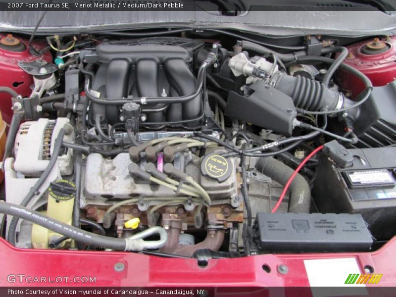 Merlot Metallic / Medium/Dark Pebble 2007 Ford Taurus SE