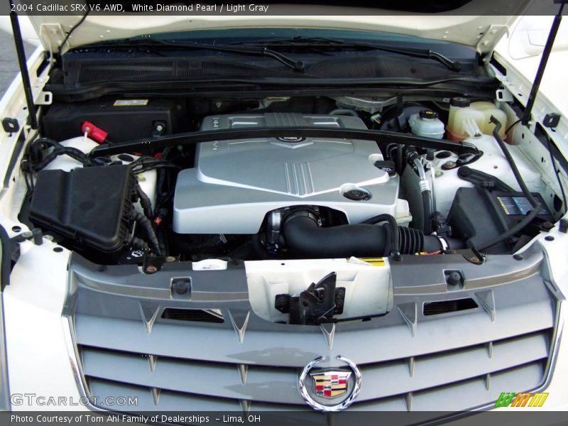 White Diamond Pearl / Light Gray 2004 Cadillac SRX V6 AWD