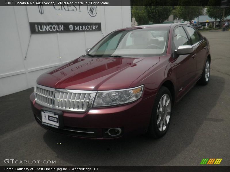 Vivid Red Metallic / Light Stone 2007 Lincoln MKZ AWD Sedan