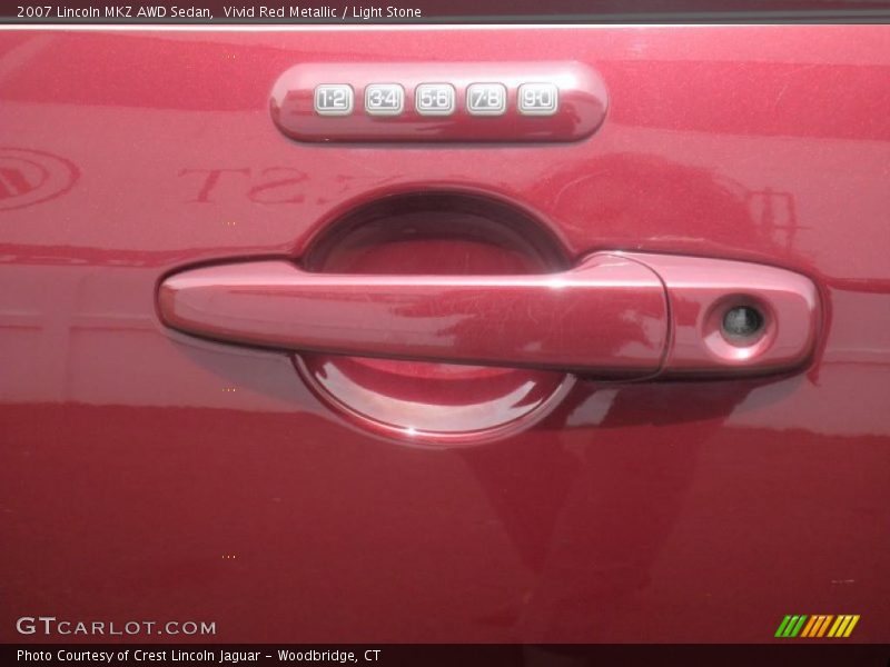 Vivid Red Metallic / Light Stone 2007 Lincoln MKZ AWD Sedan