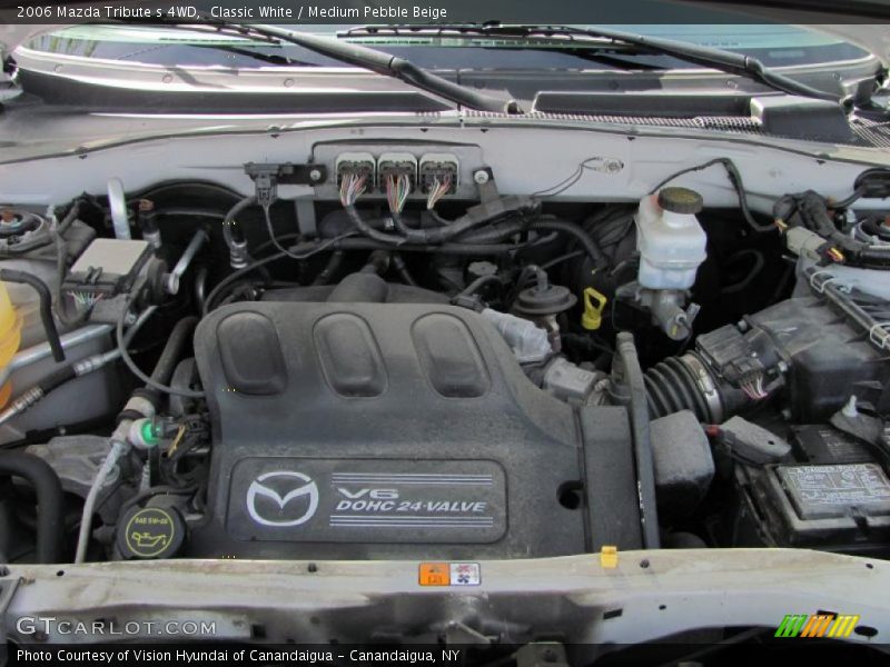 Classic White / Medium Pebble Beige 2006 Mazda Tribute s 4WD
