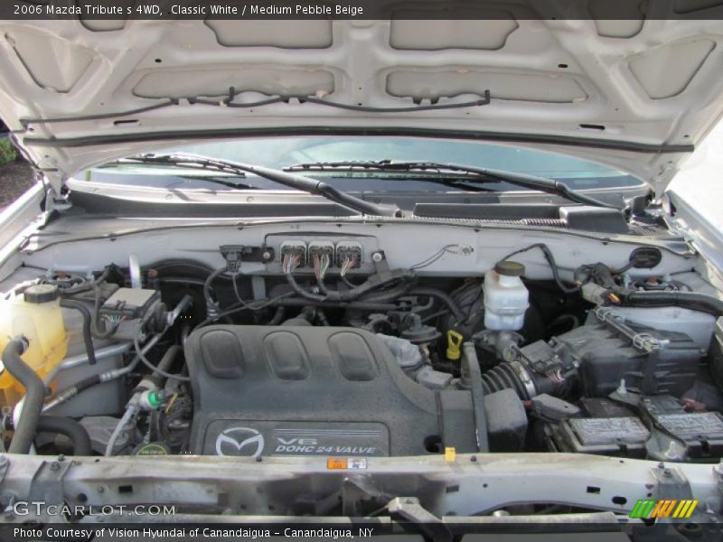 Classic White / Medium Pebble Beige 2006 Mazda Tribute s 4WD